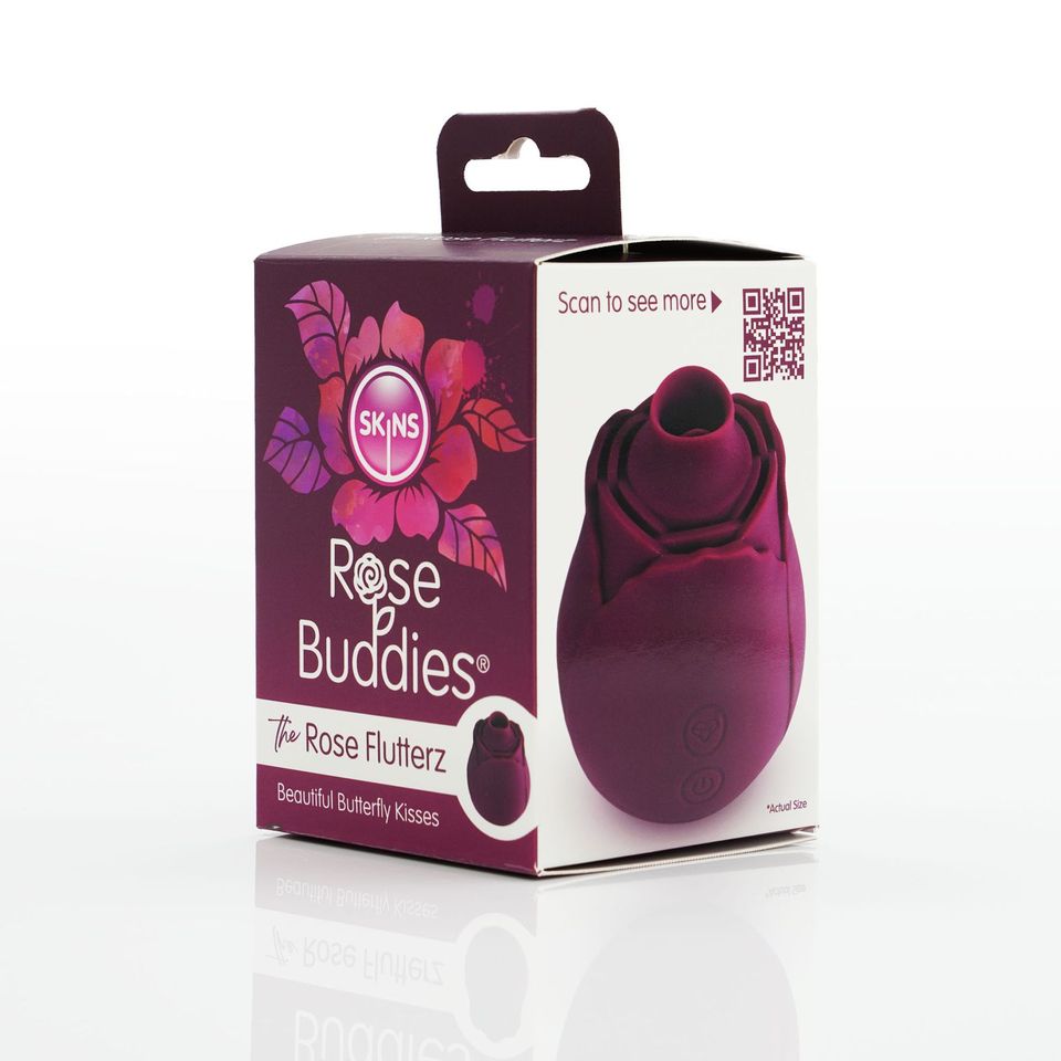 A rose-shaped clitoral vibrator in a box with the brand name Rose Buddies.