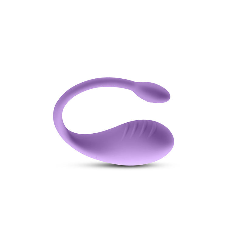 A lavender silicone vibrator with a curved shape and textured surface.