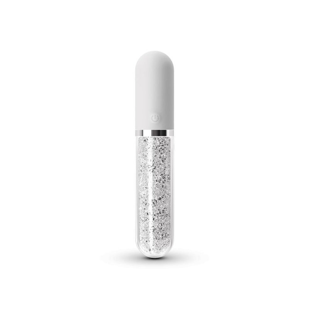 White vibrating massager with a clear tube filled with silver glitter.