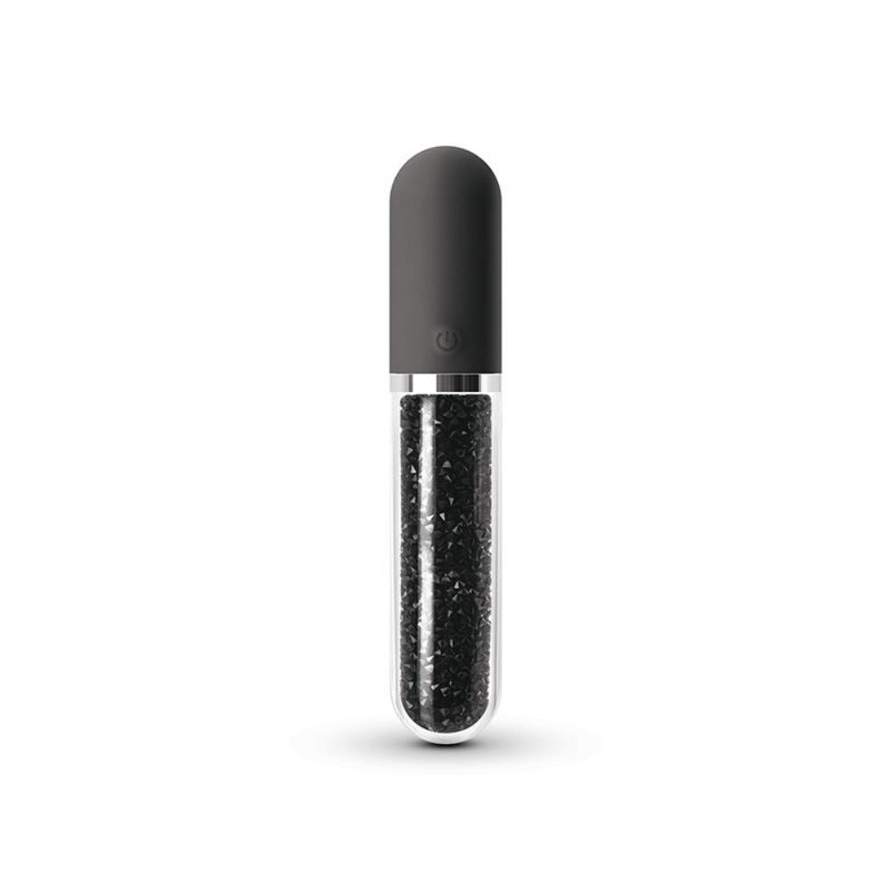 A rechargeable vibrator with a grey silicone cap and a glass tube filled with black crystals.