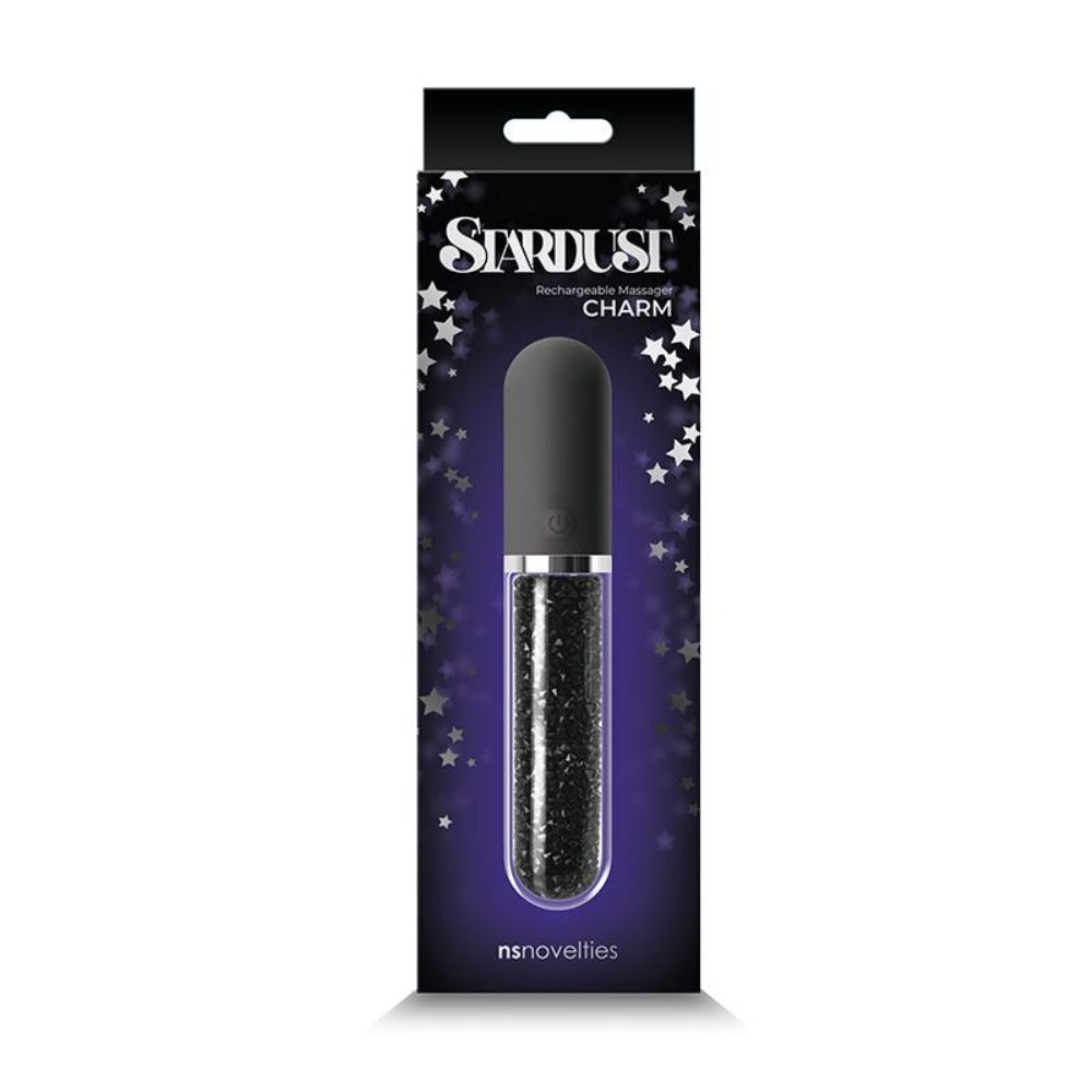 Stardust Charm rechargeable vibrator in packaging with stars.