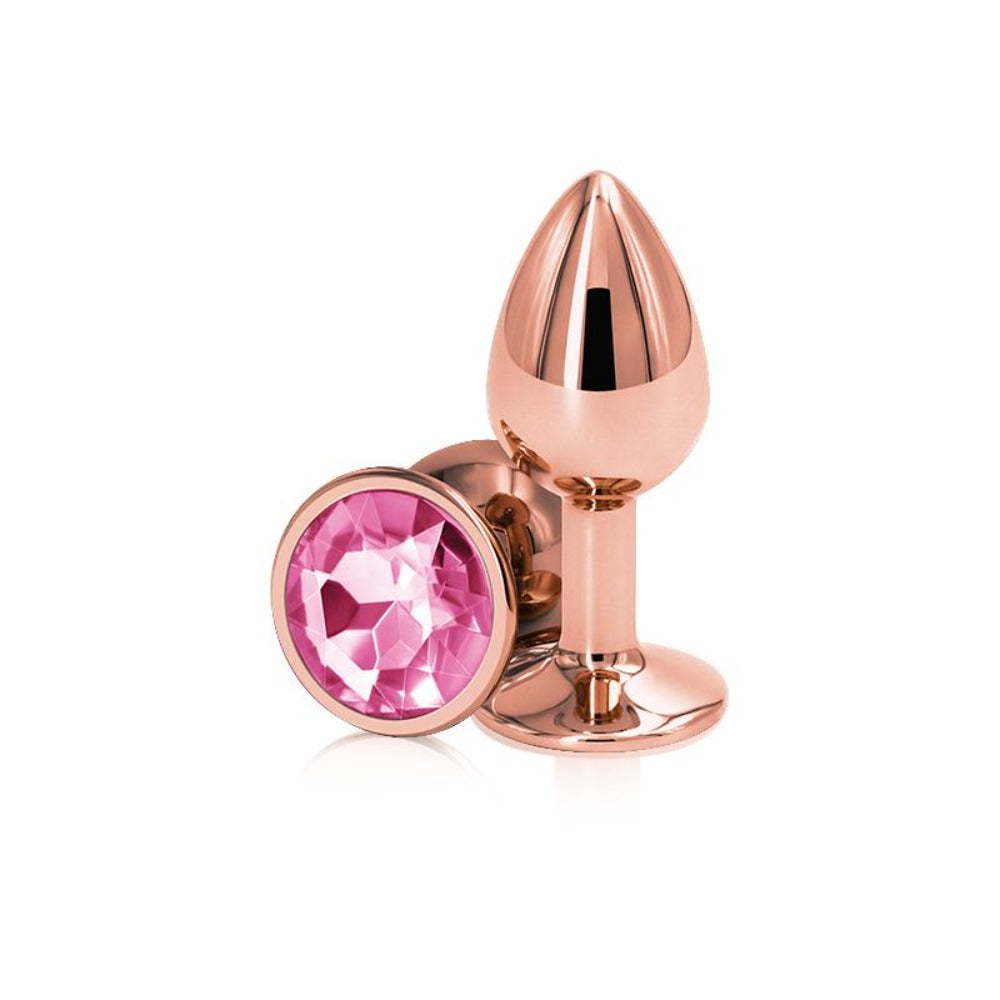 Small rose gold aluminum anal plug with a pink gem.