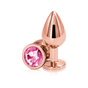 Rose gold aluminum anal plug with a pink gem.