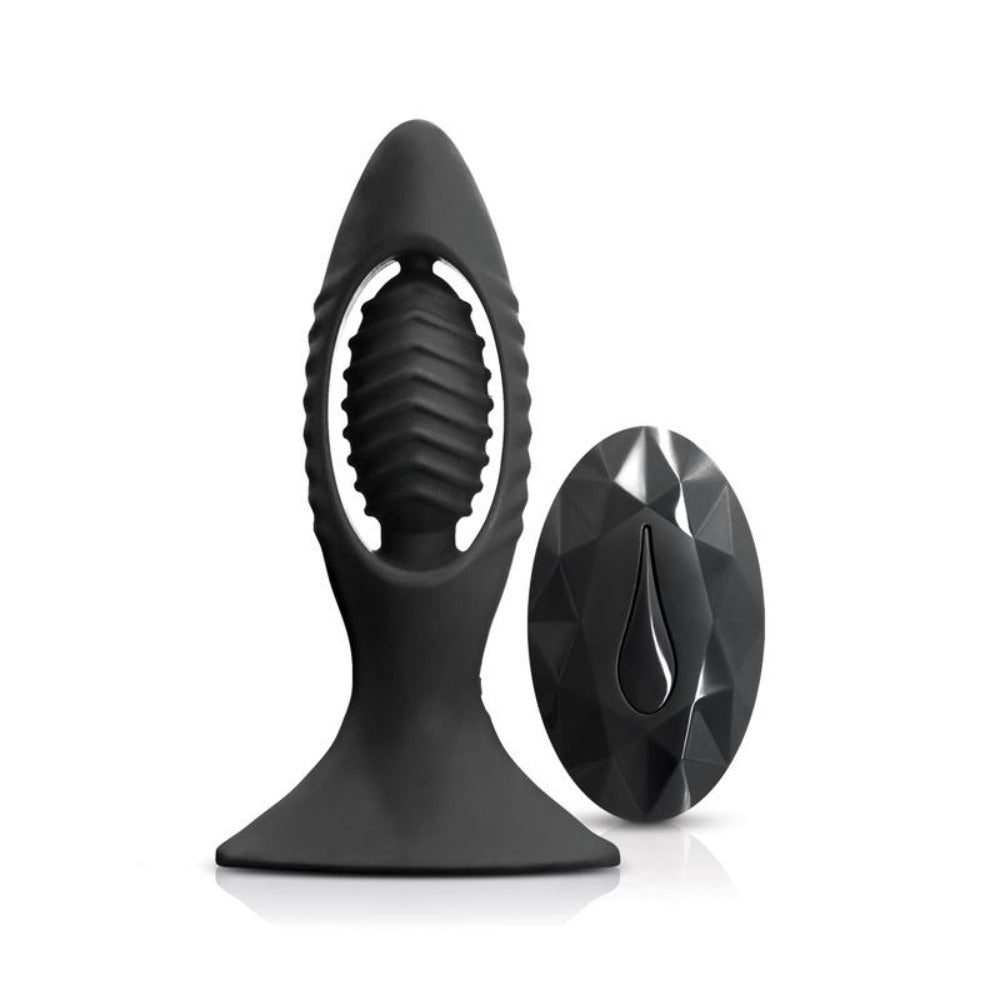 Black silicone vibrating plug with a textured insert and a faceted remote control.