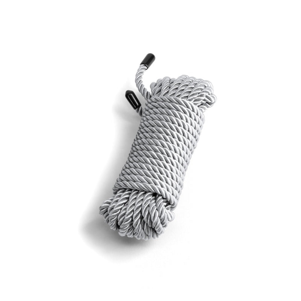 Silver soft cotton bondage rope with black capped ends.