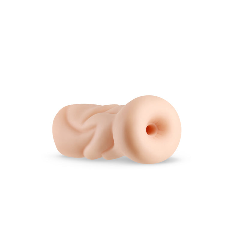 A beige textured stroker with a ribbed interior.