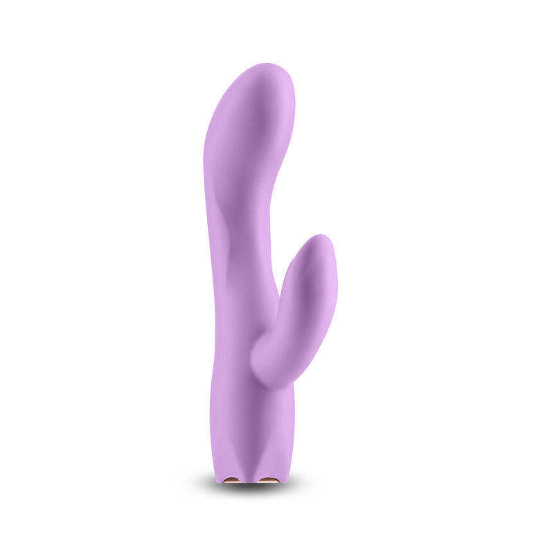 A light purple silicone vibrator with a curved shape.