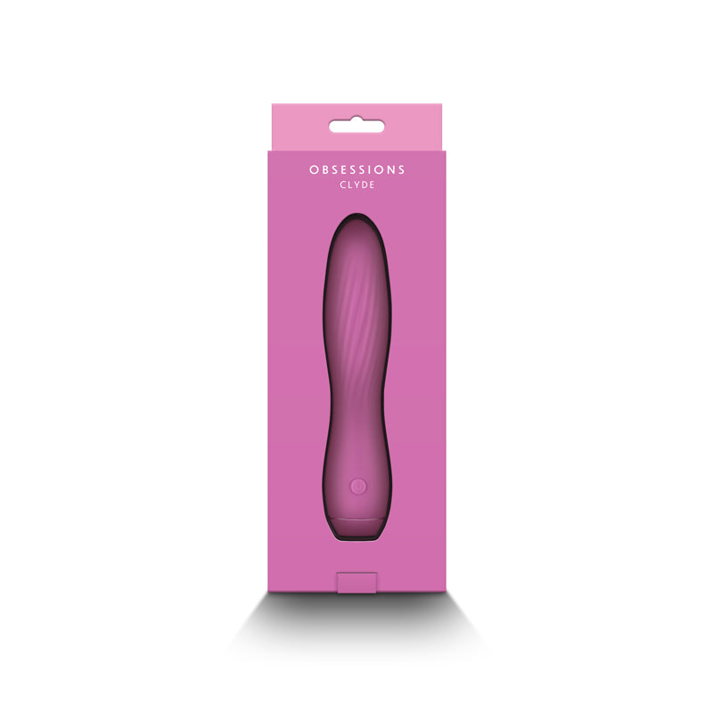 A light pink silicone vibrator in its packaging.