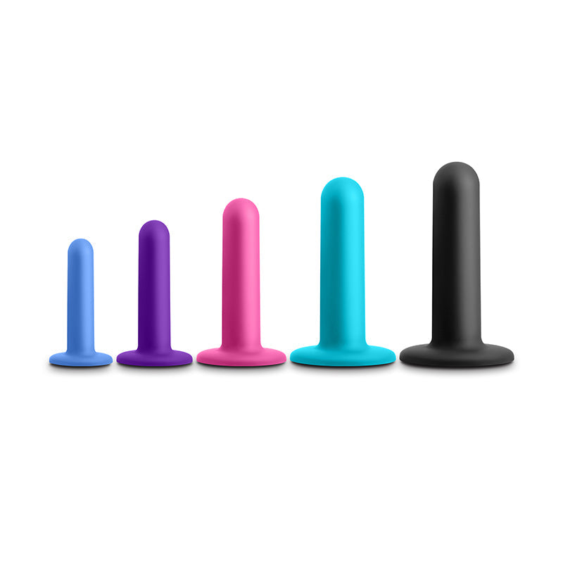 Five silicone dilators in assorted sizes and colors.