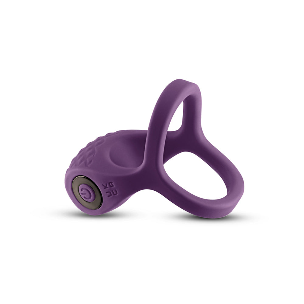 A purple vibrating silicone cock ring with a power button.
