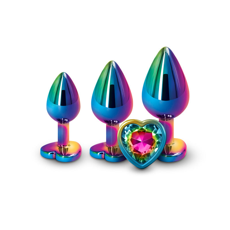 Three multicolor chrome anal plugs and a heart-shaped gem.