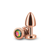 Rose gold aluminum anal plug with a rainbow gem.