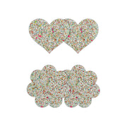 Two sets of glittery heart and flower shaped nipple pasties.