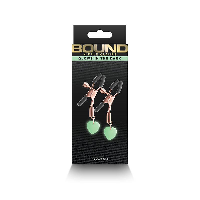 Adjustable nipple clamps with glow in the dark heart charms.