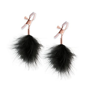 Adjustable nipple clamps with black feather poms.