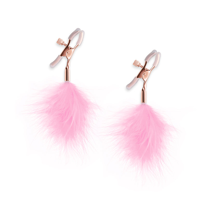 Adjustable rose gold nipple clamps with pink feather pom-poms.