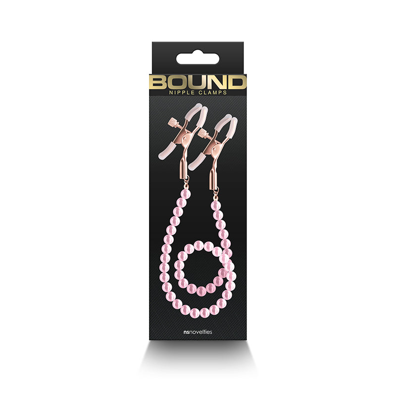 Adjustable nipple clamps with pink beads and silicone tips.