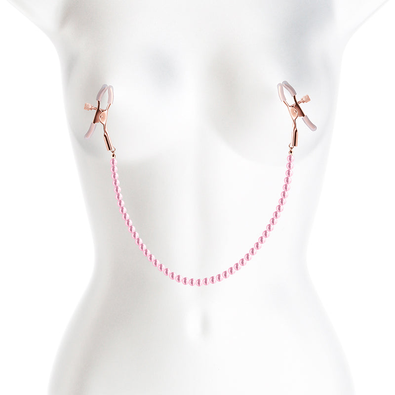 Adjustable nipple clamps with pink beads and silicone tips.