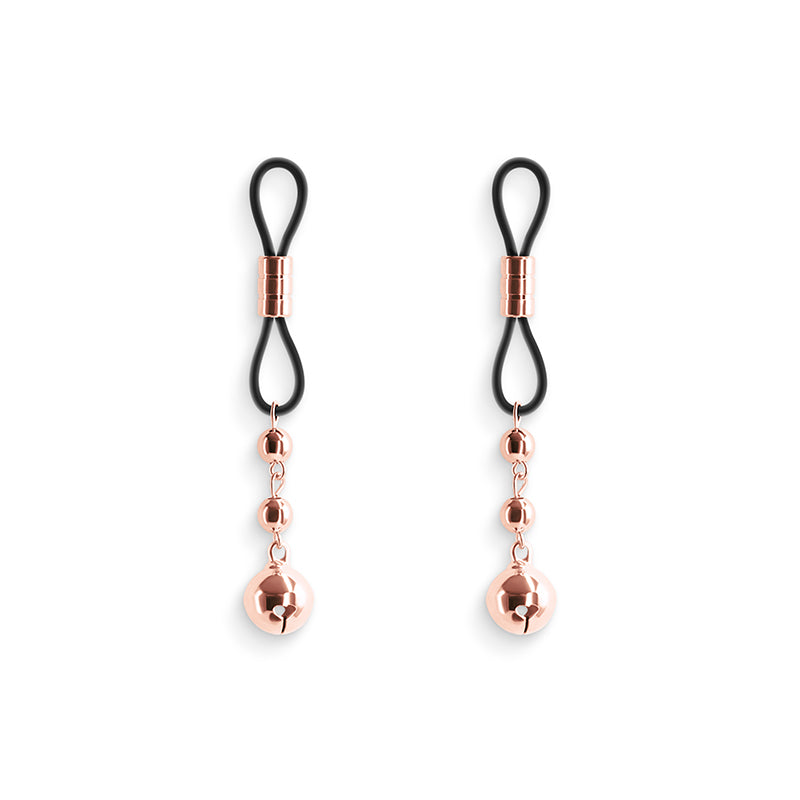 Adjustable rose gold nipple clamps with silicone tips.