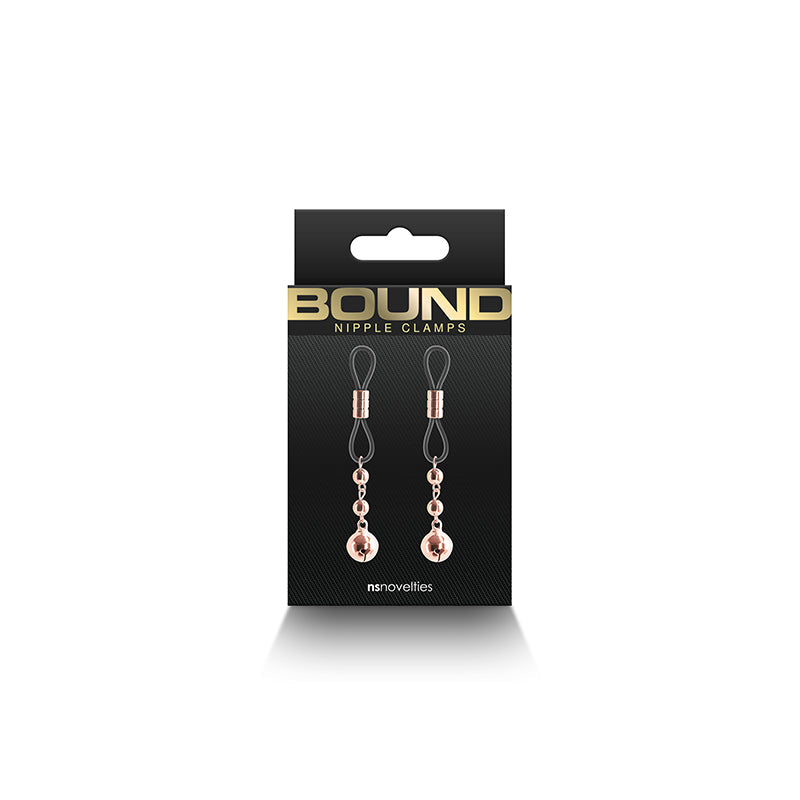 Rose gold adjustable nipple clamps with silicone tips.