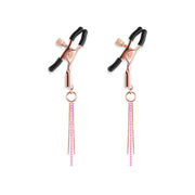 Rose gold adjustable nipple clamps with silicone tips and pink gem dangles.