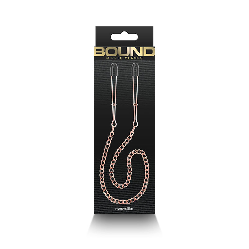 Rose gold adjustable nipple clamps with silicone tips and a connecting chain.
