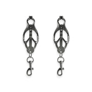 Gunmetal nipple clamps with silicone tips and dangling clips.