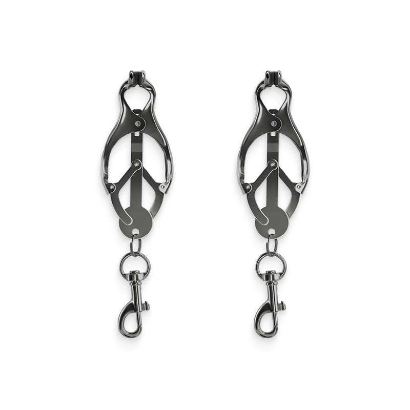 Gunmetal nipple clamps with silicone tips and dangling clips.