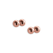 Rose gold nipple clamps with silicone tips.