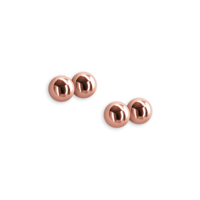 Rose gold nipple clamps with silicone tips.