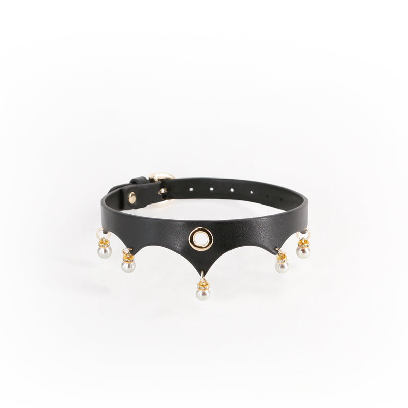 Black faux leather collar with gold accents and pearl charms.