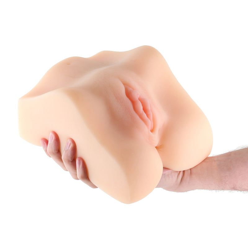 Holly Textured TPE Stroker in white held by hands.