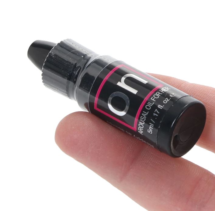 A small bottle of "on" arousal oil for her.