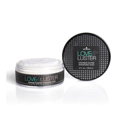 Two containers of Love & Luster Kissable Silver Diamond Dust body powder.