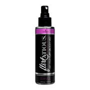 Sensuva Pomegranate Plumeria Pheromone Body Mist in a clear bottle with a black spray top.
