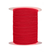 Red cotton rope wound on a spool.