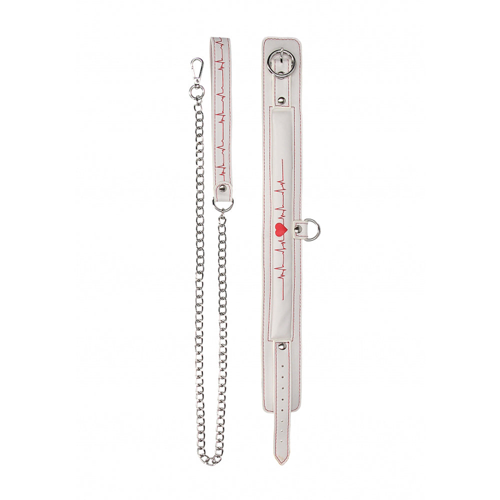 White collar and leash set with red heartbeat design and steel chain.