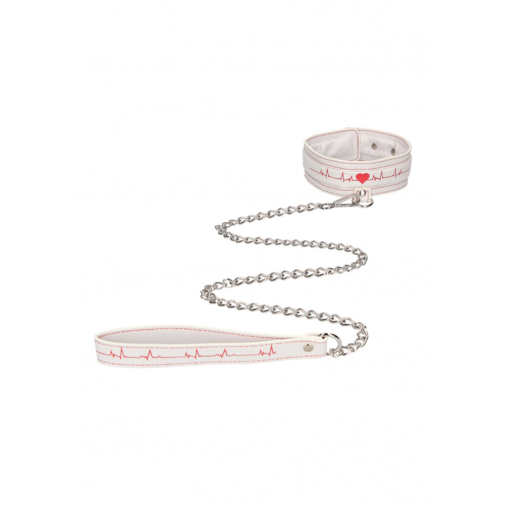 White collar and leash set with red heartbeat design and steel chain.