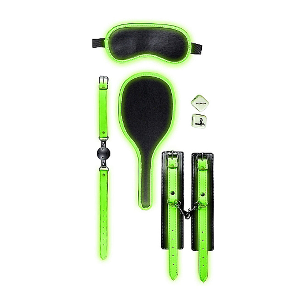 Glow in the dark bondage kit with eye mask, paddle, ball gag, cuffs, and dice.
