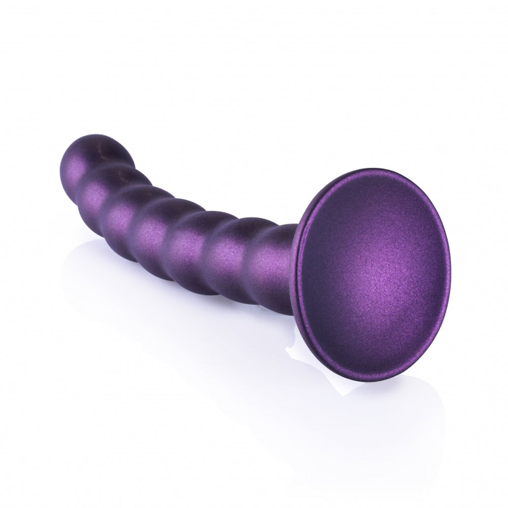 Purple beaded silicone G-spot dildo with a suction cup base.