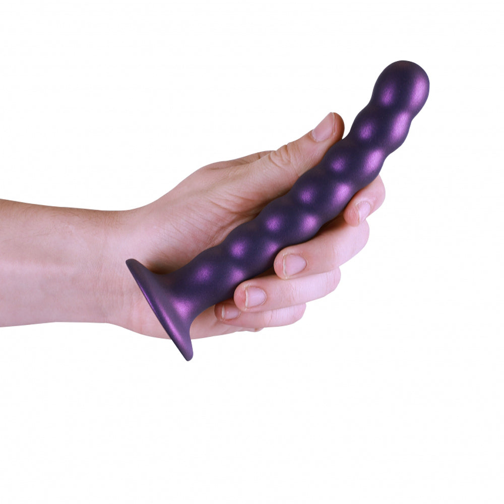 Purple beaded silicone G-spot dildo with a flared base.