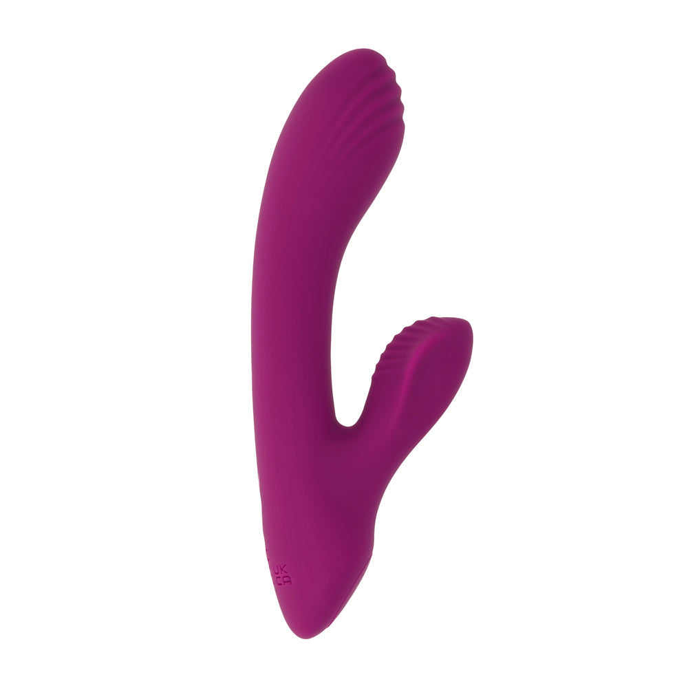 A purple rabbit vibrator with a curved shaft and ribbed stimulator.