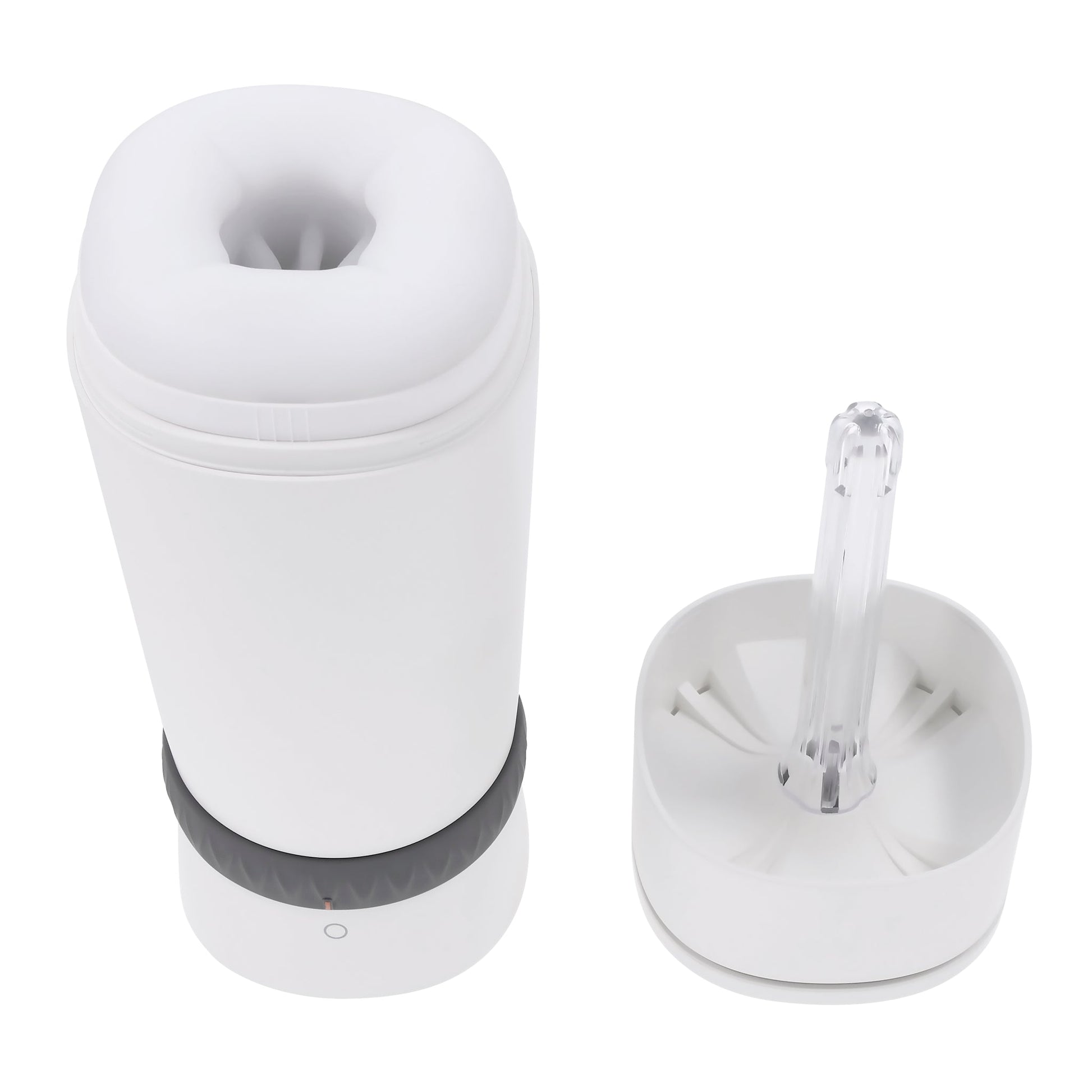 White vibrating stroker with a clear UV cleaner attachment.