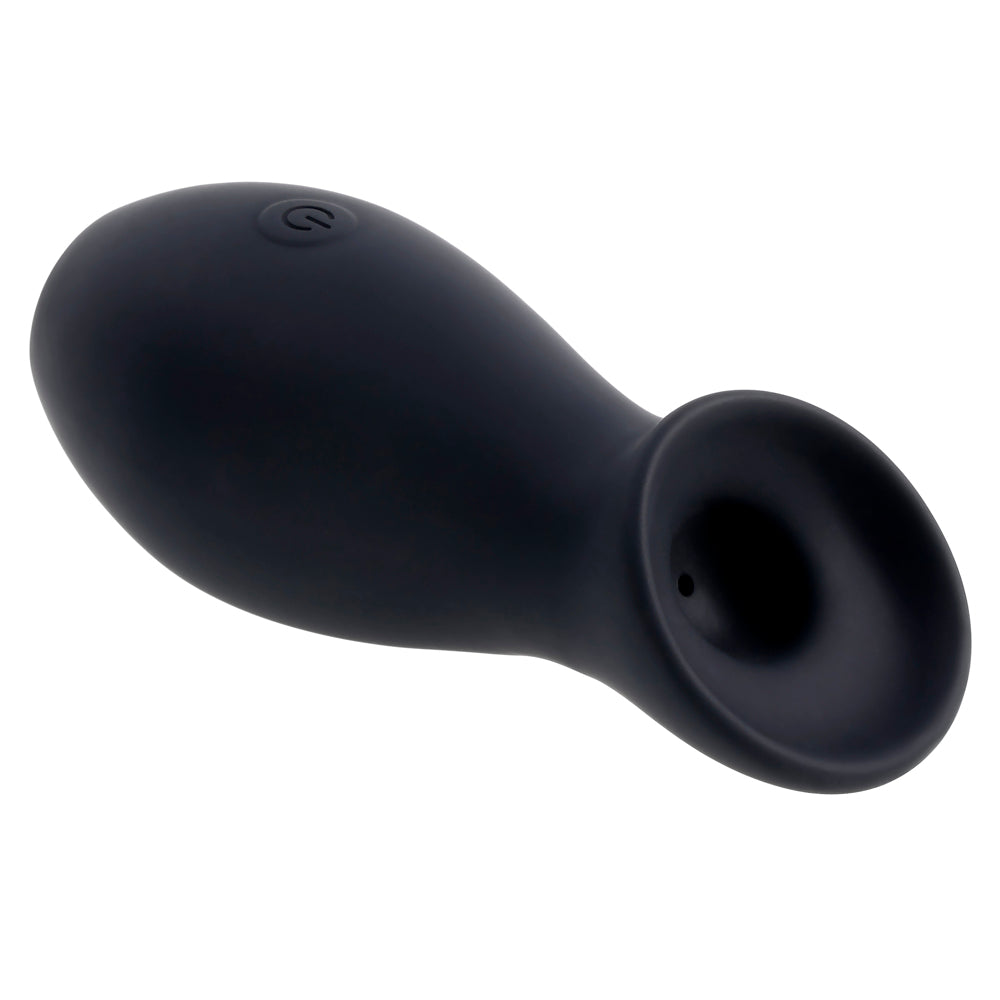 Black clitoral suction toy with a power button.