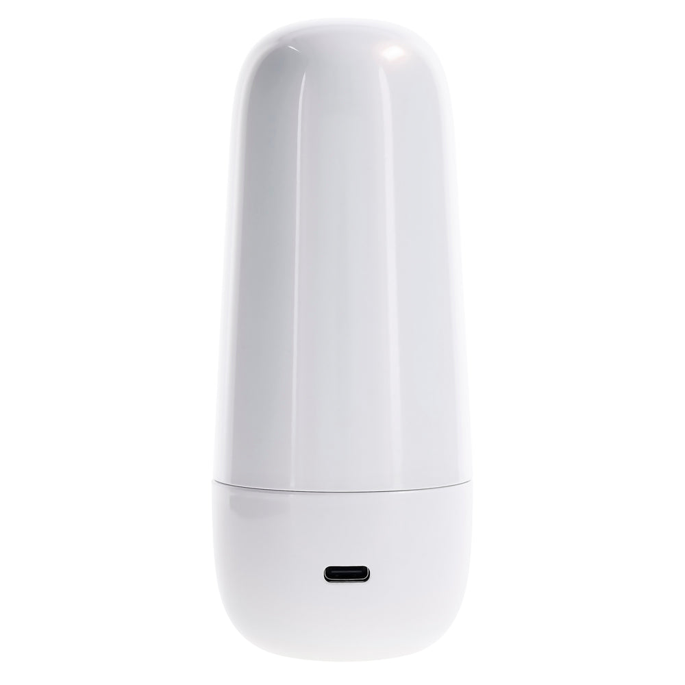 White silicone tapping toy with a USB charging port on the base.