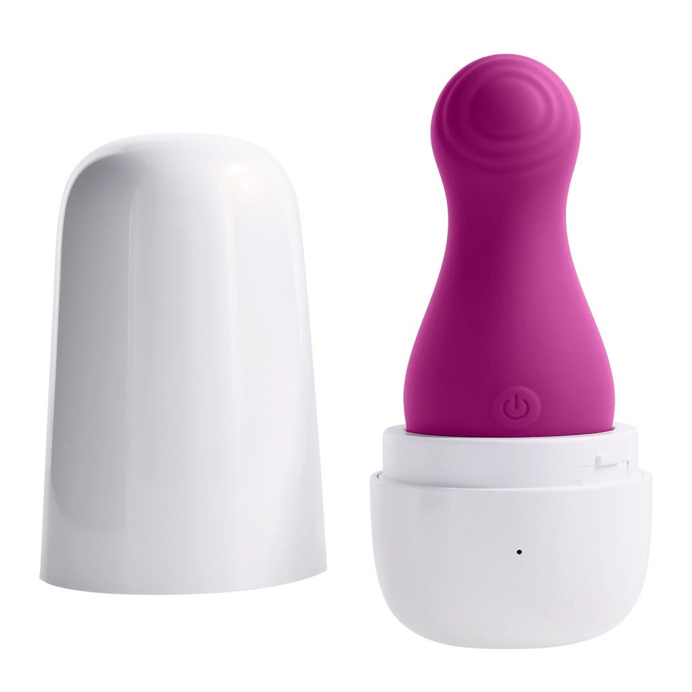 Purple clitoral tapping toy with a white charging case.