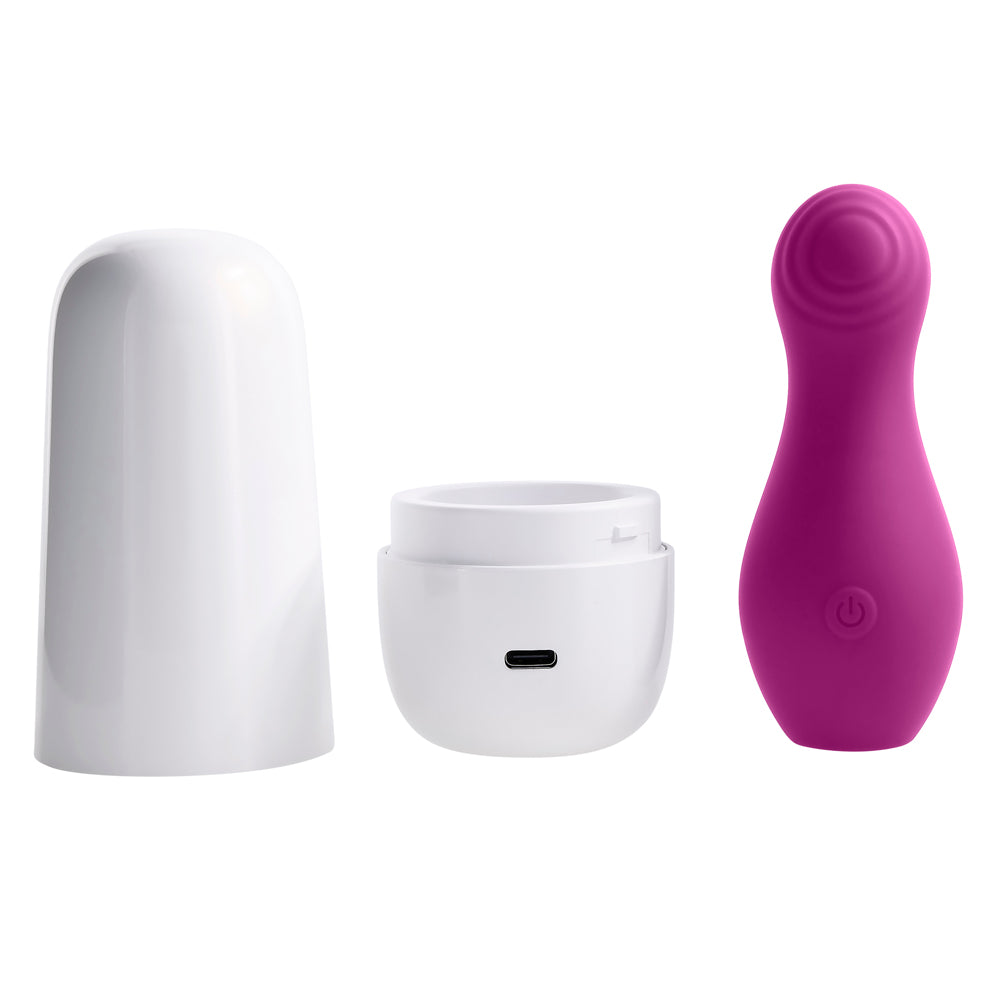 A pink clitoral tapping toy with a white charging case and lid.