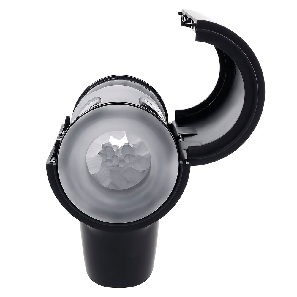Black travel stroker with textured interior and open lid.
