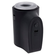 Black travel stroker with a silver rim, USB-C port, and power button.