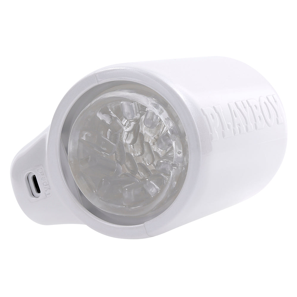 White Playboy spinning male masturbator with a textured interior and USB-C port.